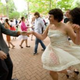 Students swing dance in a quad at St John's College